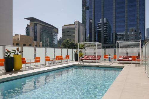 The swimming pool at or near voco Brisbane City Centre, an IHG Hotel