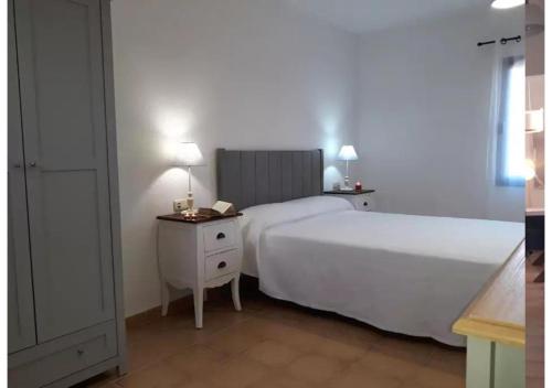 Postel nebo postele na pokoji v ubytování Anahi Homes Corralejo - Villa Codeso 5