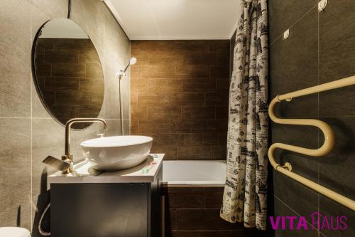 Ένα μπάνιο στο Квартира студия в центре Loft