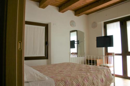 Posteľ alebo postele v izbe v ubytovaní A casa di Giò