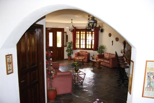 an archway leading into a living room at Hotel Mary in Marathokampos