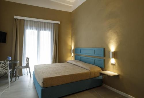 Katil atau katil-katil dalam bilik di Palazzo Mancina