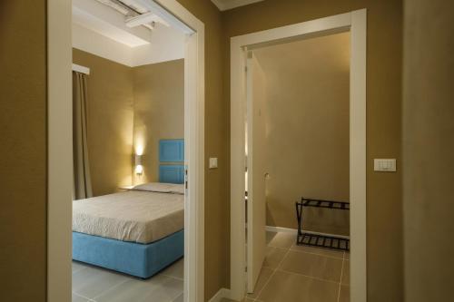 Katil atau katil-katil dalam bilik di Palazzo Mancina
