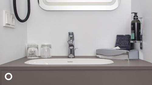 a bathroom counter with a sink in a room at Midgardur by Center Hotels in Reykjavík