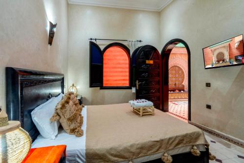 Postel nebo postele na pokoji v ubytování Riad Haj Thami