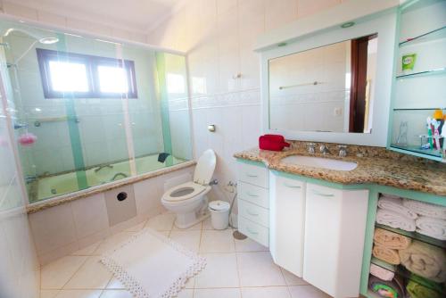 Et badeværelse på Casa de campo c lazer completo em Joanopolis - SP