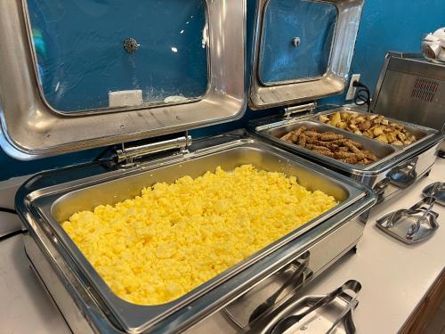 a tray of food sitting on a counter with food at Sunbird Cape Cod Resort in West Yarmouth