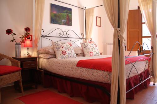 Een bed of bedden in een kamer bij B&B Il casale dei gechi