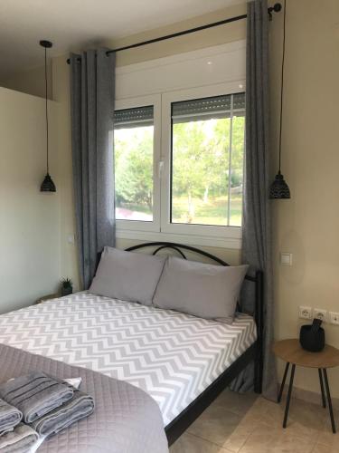 Posteľ alebo postele v izbe v ubytovaní georgia's cozy rooms #3