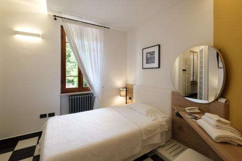 Postel nebo postele na pokoji v ubytování Hotel Ristorante Alla Vittoria