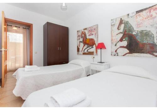 Postel nebo postele na pokoji v ubytování Anahi Homes Corralejo - Villa Brezo 3