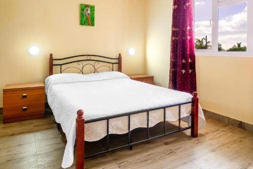 En eller flere senge i et værelse på Residence Barbera Apartments
