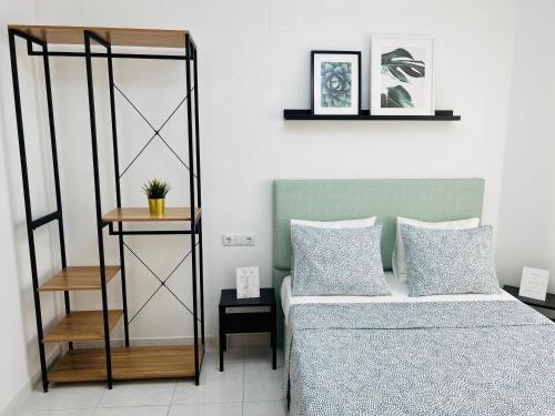 Cama o camas de una habitación en Apartamento Sant Roc