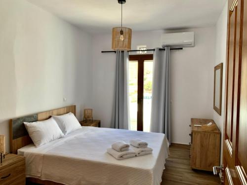 Кровать или кровати в номере Komis Crown - Luxury Apartments