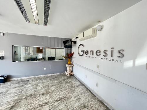 a lobby with a sign that reads genesis fusion imperial at Genesis Suites / Lofts in San Luis Potosí