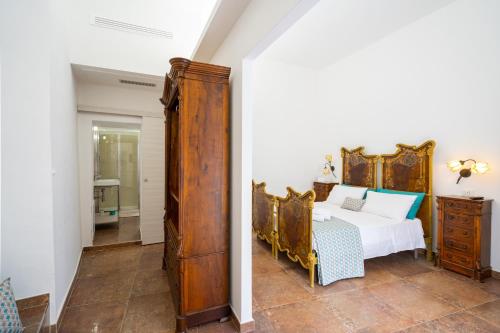 Una cama o camas en una habitación de SOGNI DA MARE