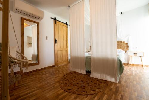 Postel nebo postele na pokoji v ubytování Casa Alegría