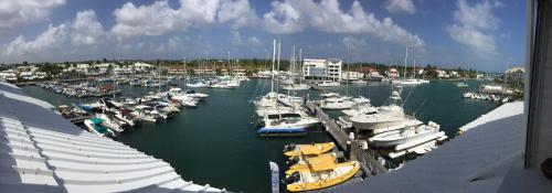a bunch of boats docked in a harbor at Entre Ciel Et Mer in Saint-François