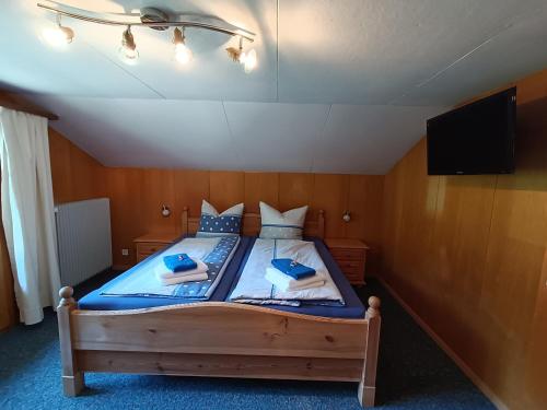 Ein Bett oder Betten in einem Zimmer der Unterkunft Chalet Filfalle