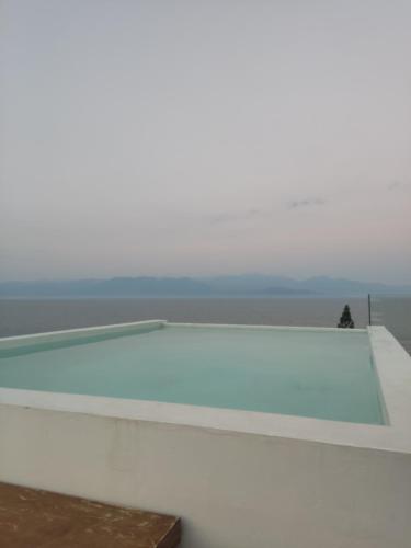 a view of the ocean from the top of a building at ThalaSEA Apartments in Chrani