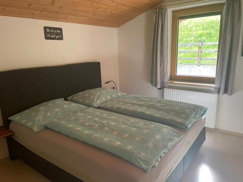 Ένα ή περισσότερα κρεβάτια σε δωμάτιο στο Apartment Evelyn