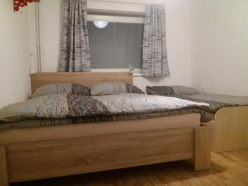 Postel nebo postele na pokoji v ubytování Apartmán Na Skále