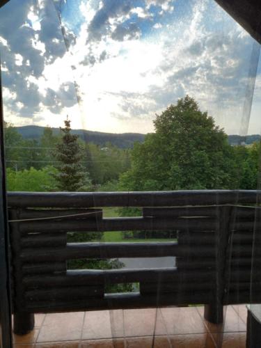 a window with a view of the mountains at Dom gościnny u Krupów in Polańczyk