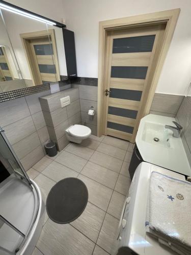 Kúpeľňa v ubytovaní Baltica Heaven Apartmant 95F