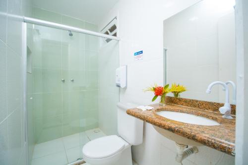 Kylpyhuone majoituspaikassa Na Praia Hotel