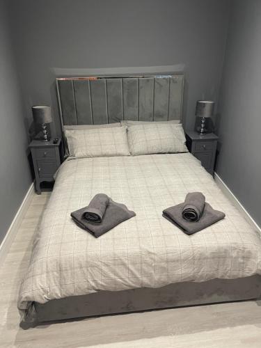 מיטה או מיטות בחדר ב-Costa Del Brid