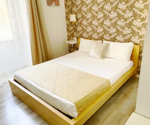 Ліжко або ліжка в номері Appia 52