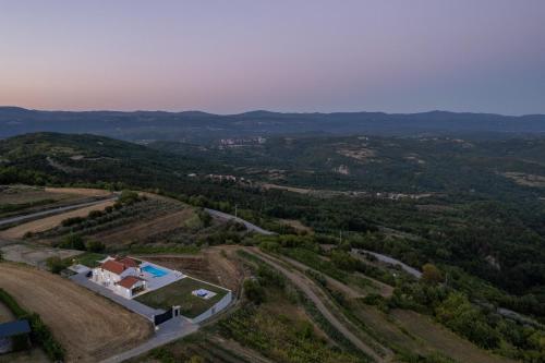 an aerial view of a house in a field at Villa Panorama in Buzet
