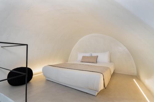 Tempat tidur dalam kamar di Alme villas