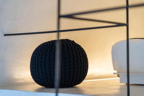 a microphone sitting on a table in a room at Alme Luxury Cave Villas in Vóthon