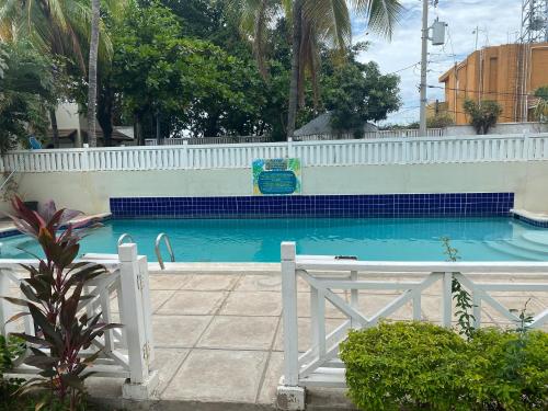 The swimming pool at or close to Finest Accommodation Renfrew Place 4-12 Renfrew Rd 2 bedroom 2 bat Apt # 15 New Kinston Jamaica