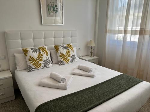 Ένα ή περισσότερα κρεβάτια σε δωμάτιο στο Oktheway Perbes Vintage 2