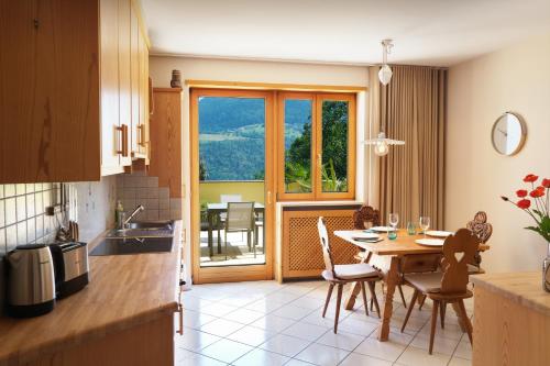 Kuchyňa alebo kuchynka v ubytovaní Apartment Cascada - Alpstay