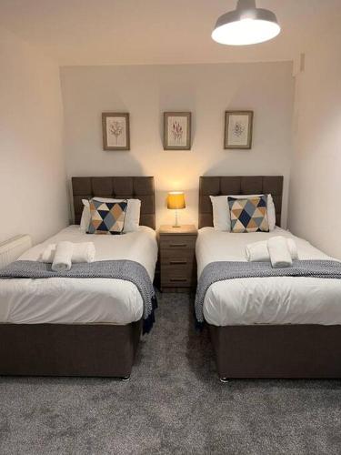 Ліжко або ліжка в номері Bridge Place - Spacious home with plenty of beds!