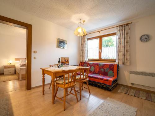 a living room with a table and a couch at Apartment Claudia in Vandans