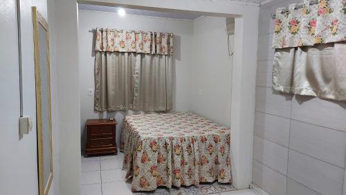 Ένα ή περισσότερα κρεβάτια σε δωμάτιο στο Hostel pé da serra