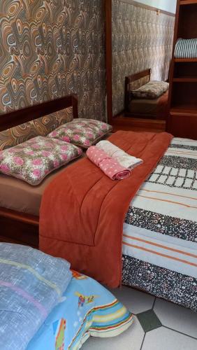Ένα ή περισσότερα κρεβάτια σε δωμάτιο στο Hostel pé da serra