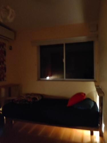 Una cama o camas en una habitación de jiro de kamakura