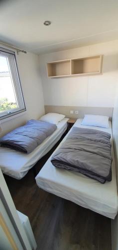 Posteľ alebo postele v izbe v ubytovaní MH 6 personnes au calme Bois Dormant 4*