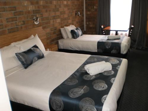 Кровать или кровати в номере Motel Goolwa