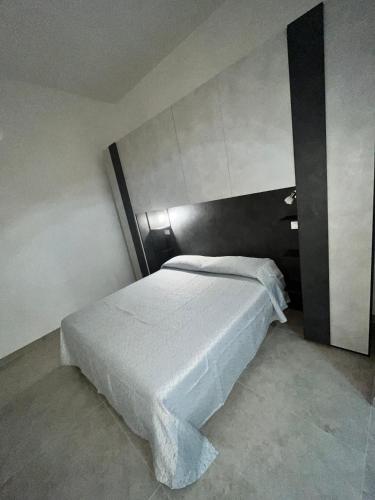Postel nebo postele na pokoji v ubytování Le Dimore di TOTIGGIA 2.0