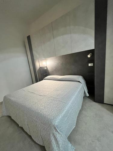 Postel nebo postele na pokoji v ubytování Le Dimore di TOTIGGIA 2.0
