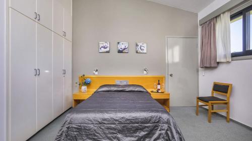Postel nebo postele na pokoji v ubytování Troodos Hotel & Spa