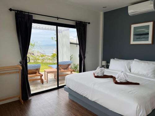 Postel nebo postele na pokoji v ubytování Pearl of Samui Resort