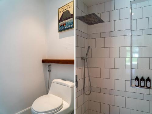 a bathroom with a toilet and a shower at THALEMAAN POOL VILLA in Koh Samui 