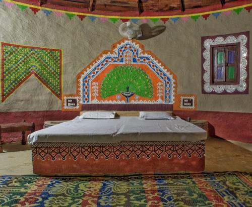 מיטה או מיטות בחדר ב-Rann Visamo Resort